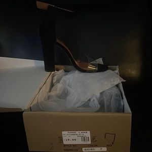 Brand new black heels. Size 7